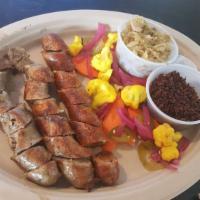 Sausage Sampler · House pickle salad, house whole grain mustard and bread.