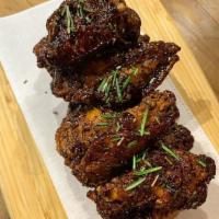 Slow Roasted Chicken Wings · Marinated in garlic, balsamic, and lemon zest. 