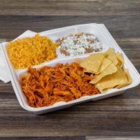 Chicken Tinga Bowl · Slow cooked spicy shredded chicken breast.
comes with lettuce, rice, beans, cheese, guacamol...