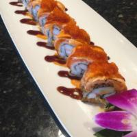 Queen's Special Maki · Crabmeat, shrimp, avocado, tempura flakes and spicy mayo topped with torched salmon, scallio...
