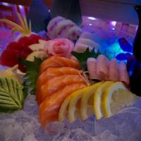 15 Pieces Sashimi Boat · Assorted filets of fresh raw fish.