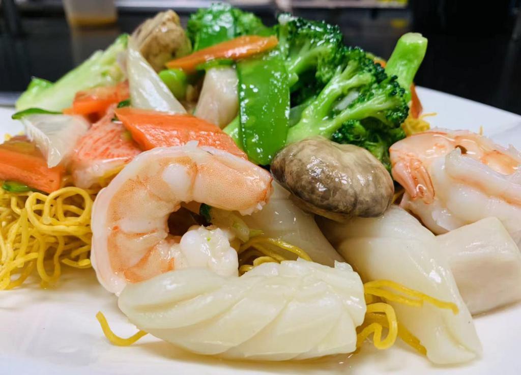 Seafood Pan-Fried Noodle · Scallops, shrimp and calamari.
