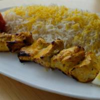 Chicken Kabob · Boneless pieces of chicken breast marinated in special herbs and spices, broiled on a skewer.