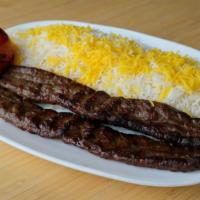 Beef Shami Kabob · Ground beef delicately spiced broiled on a skewer served with choice of bread or saffron rice.
