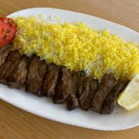 Beef Tikka Kabob · Chunks of tender beef, marinated in special herbs and spices, broiled on a skewer served wit...