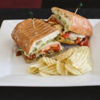 Chicken Panini · Charbroiled Chicken Breast, Pesto, Roasted Red Peppers, Tomatoes And Provolone. Served On Ci...