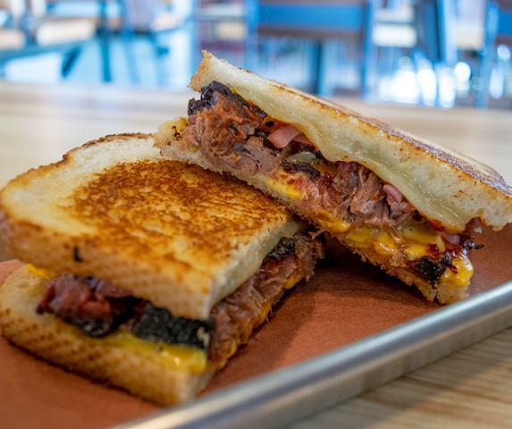 Burnt End Grilled Cheese · burnt ends, muenster, american cheese, cheesy fun-do, pickled red onion