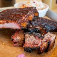 Winners Win! · 16-hour smoked black angus hand-carved brisket & burnt ends. Served with pickles, texas toas...