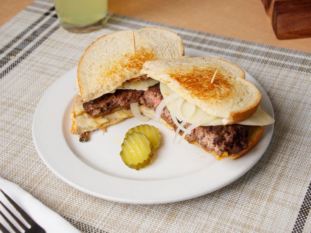 Patty Melt · Huge burger patty with grilled onions and provolone cheese on sourdough bread.