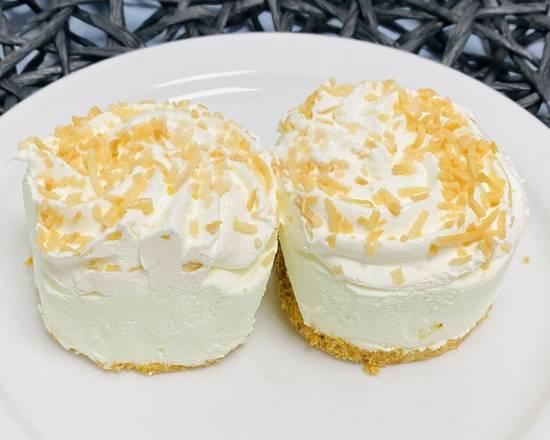 The Lime and the Coconut · Beautiful little bistro pies with cookie crumb base, real key lime mousse, then topped with whipped cream and toasted coconut.