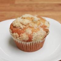 Blueberry Muffin · Baked with juicy blueberries and topped with a generous coat of our special crumb topping fo...