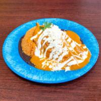 Chile Relleno · Souffle battered roasted poblano pepper stuffed with a blend of three cheeses, tomato broth,...