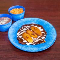 Enchiladas · 3 corn tortillas rolled around your choice of filling covered in mole, salsa verde, tomato s...