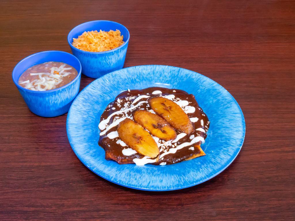 Enchiladas · 3 corn tortillas rolled around your choice of filling covered in mole, salsa verde, tomato serrano, or red guajillo. served with beans and rice