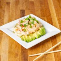 Shrimp Avocado Salad Plate · Gulf shrimp tossed in a Sriracha aioli with sweet onions and radishes in a 1/2 avocado, topp...