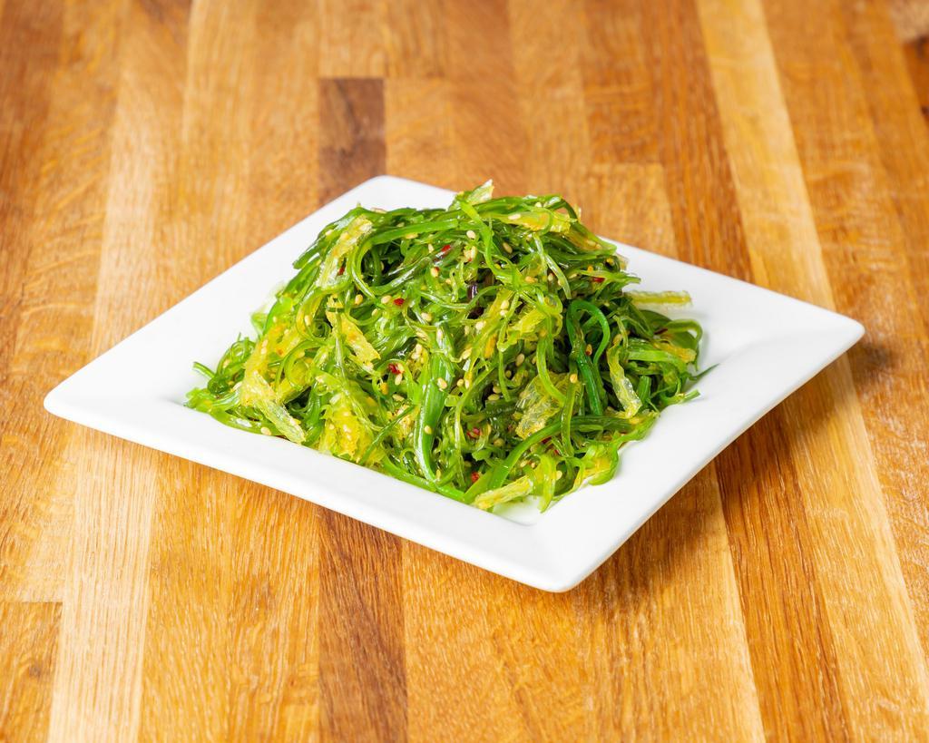Japanese Seaweed Salad · Traditional bright green seaweed salad with miso, soy, mirin, and sesame oil.
