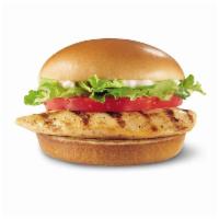 Grilled Chicken Sandwich · Juicy all-white meat chicken breast topped with crisp lettuce, ripe tomato, and salad dressi...