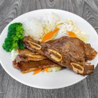 Kalbi Short Ribs · Combo plate served with steamed rice, macaroni salad & steamed vegetables.