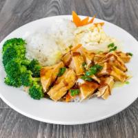 Teriyaki Tofu Bowl · Served with steamed rice and steamed vegetables.