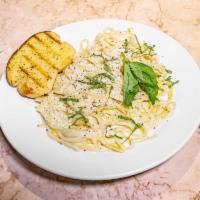 Fettuccine Alfredo  · Homemade creamy Alfredo sauce over freshly blanched fettuccine, topped with hand-grated Peco...