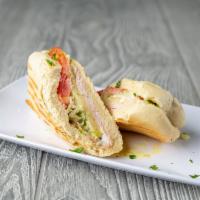 Turkey Sandwich · Multigrain baguette, Swiss cheese, tomato, lettuce, and mayo.