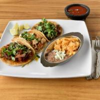 Tacos Special Original · Corn or flour tortilla topped with cilantro, onions and your choice of meat side of rice and...