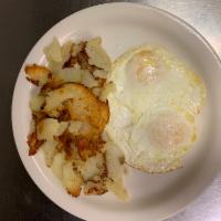 2 Eggs  · Served with home fried potato and a buttered plain bagel.