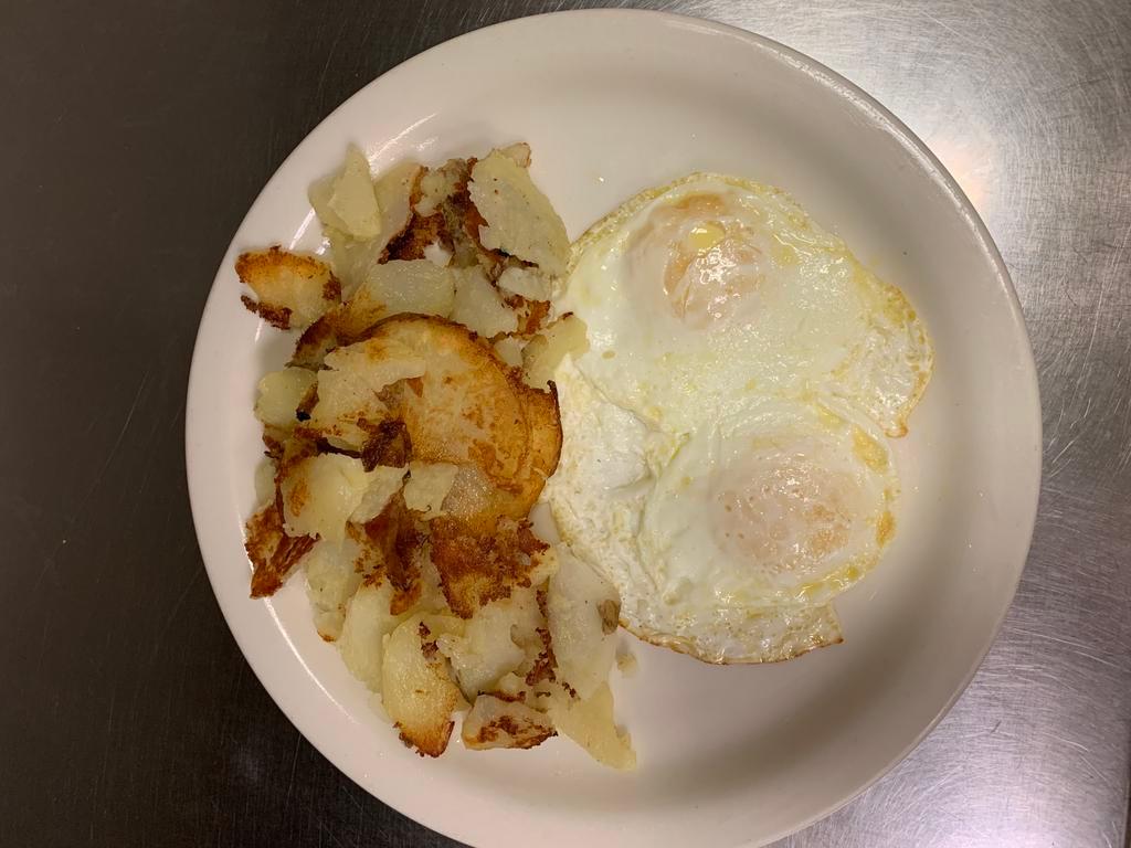 2 Eggs  · Served with home fried potato and a buttered plain bagel.