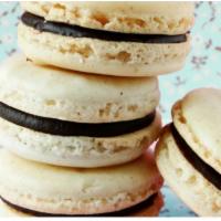 Vanilla Bean Chocolate Macaron · Classic vanilla flavored shell with vanilla buttercream filling (shell can be any color, but...