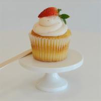 Strawberries -N- Cream Cupcake · Strawberry cream cheese frosting on yellow cake.
