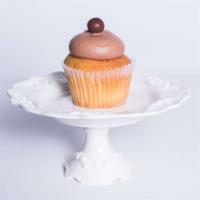 Classic Cami Chocolate Cupcake · Our signature yellow cake with classic chocolate buttercream frosting.
