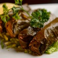 Grape Leaves · Rolled with rice, tomatoes and parsley.