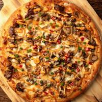 Philly Cheesesteak Pizza · Grilled sirloin and onions, Voodoo Ranger Queso, mozzarella cheese, red pepper and chipotle ...