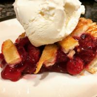 Tart Cherry Pie · Pacific Northwest sour cherries, sweetened & baked with a lattice crust.