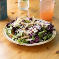Salad · Fresh local seasonal greens tossed in avocado-lime vinaigrette and topped with Cotija cheese...