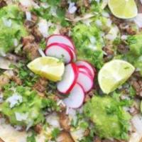 Tacos San Cosme · 3 Regular size tacos, topped with salsa Verde & Roja. Slice radish and lime wedges on the si...