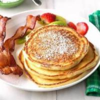 Pancakes Lunch Special · Served with bacon or sausage, egg any style, butter and syrup. Fruit option available.