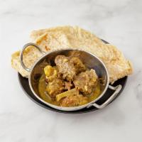 Goat Curry with Roti · 