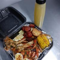 Single Seafood Box · Snow Crab Cluster Pieces, Shrimp, Corn, Beef Sausage, Potatoes And Egg In A Garlicky Butter ...
