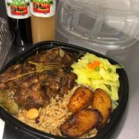 Jerk Chicken Dinner · Grilled chicken jerked with Zoe's in house made spicy jerk sauce. Served with rice and beans...