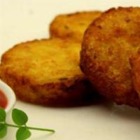 Aloo Tiki · Two fried potato and spice patties. Vegan.