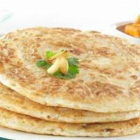 Aloo Paratha · Stuffed bread with mashed potato mixed with cilantro, herbs and spices.