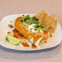 Big and Saucy Burrito · Wet burrito. Choice of meat, choice of beans, lettuce, cheese, tomatoes, onions, olives, sou...