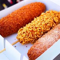 Crispy Ramen Rice Dog · Crispy ramen crust with rice dog. Your order comes with 1 FREE sauce of your choice. Ketchup...