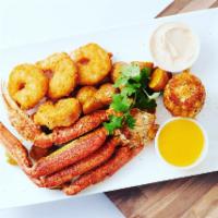 Fried Crab Legs · Crab Cluster, Jumbo Shrimp, Corn & Potatoes in special butter sauce