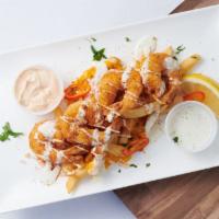 Shrimp Fries · Jumbo Fried Shrimps, Seafood sauce, cheese sauce, cilantro, chives, cajun old bay fries &  c...