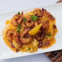 Shrimp and Grits · Marinated jumbo shrimp, creamy yellow stone ground grits smoked turkey sausage red peppers c...