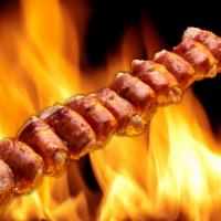 FRANGO COM BACON · Frango com Bacon, chicken wrapped in bacon, is a Rodizio Grill guest and staff favorite. Ten...