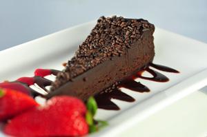 TORTA BRIGADEIRO GF · A luxurious indulgence for chocolate lovers, it features a slice of decadent chocolate mouss...