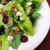 Candied Walnut Salad · Mesclun salad with candied walnuts, cranberries, blue cheese, raspberry dressing